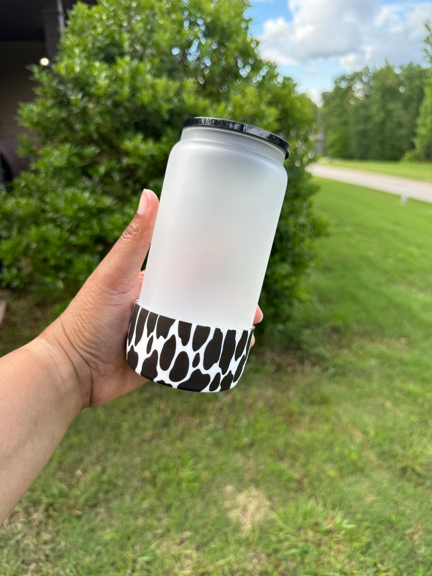 Silicone (cow print-black) tumbler boot for popular 40 oz tumblers and glass cans