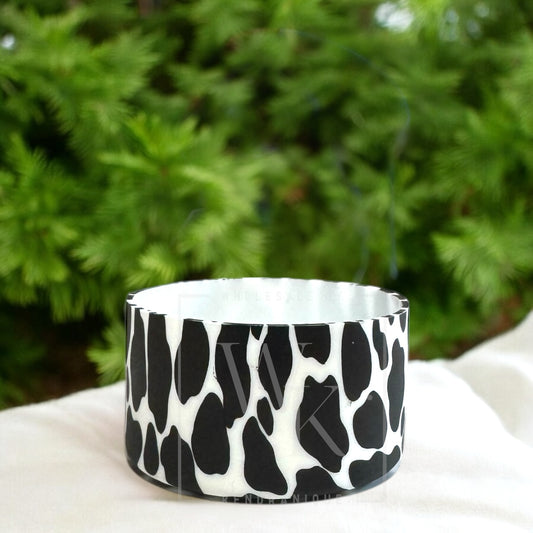Silicone (cow print-black) tumbler boot for popular 40 oz tumblers and glass cans